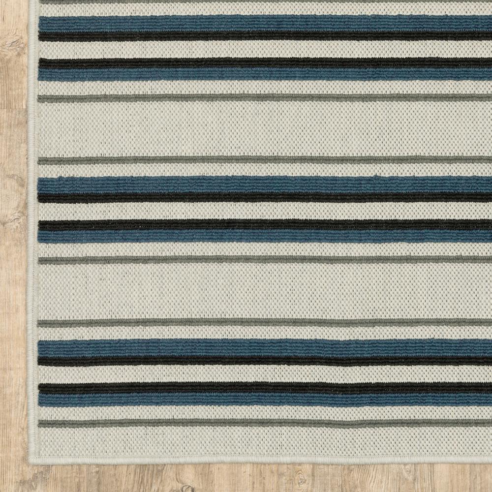2' X 7' Blue and Beige Geometric Stain Resistant Indoor Outdoor Area Rug. Picture 4