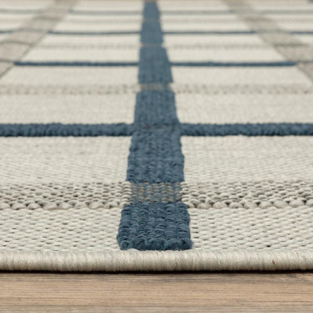 7' x 9' Blue and Beige Geometric Stain Resistant Indoor Outdoor Area Rug. Picture 5