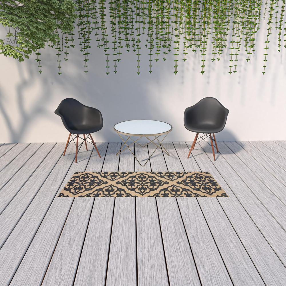 2' X 8' Beige and Black Oriental Stain Resistant Indoor Outdoor Area Rug. Picture 2