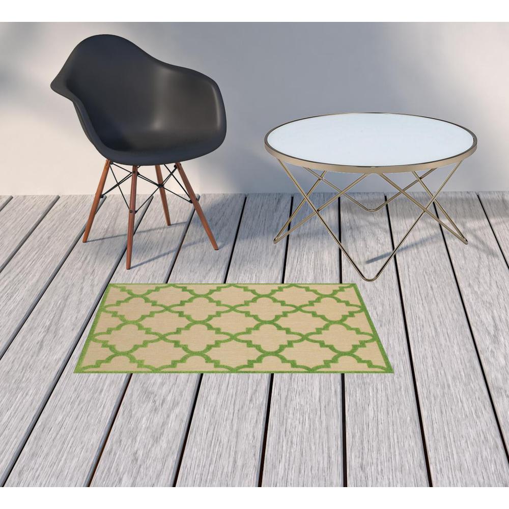 2' x 3' Green Geometric Stain Resistant Indoor Outdoor Area Rug. Picture 2