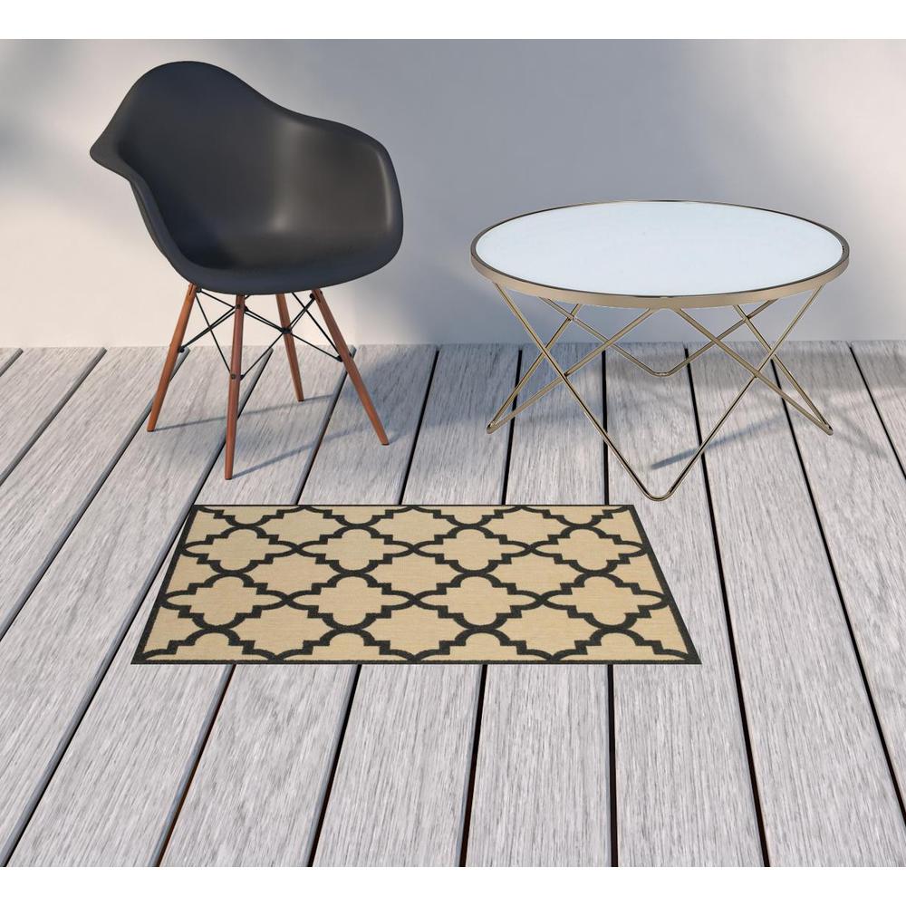 2' x 3' Beige and Black Geometric Stain Resistant Indoor Outdoor Area Rug. Picture 2