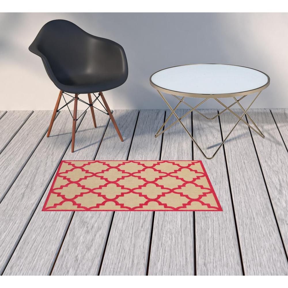 2' x 3' Pink Geometric Stain Resistant Indoor Outdoor Area Rug. Picture 2