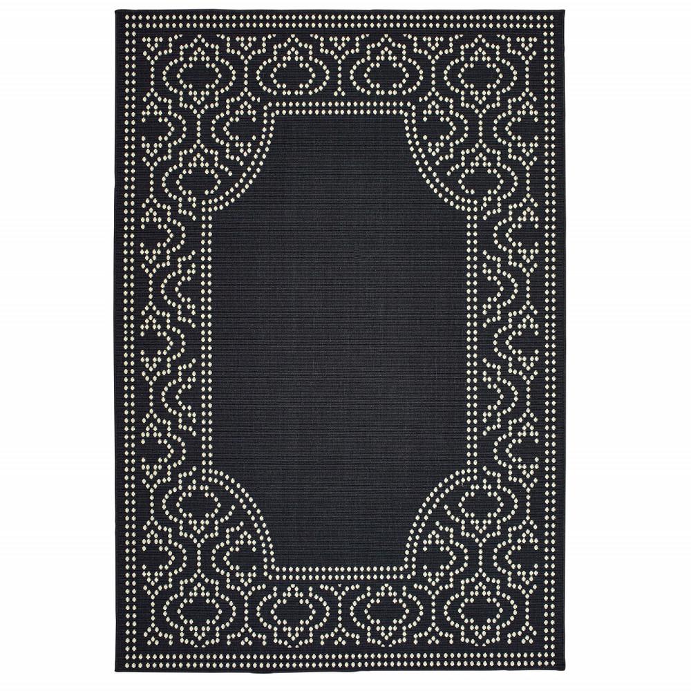 2' X 4' Black and Ivory Stain Resistant Indoor Outdoor Area Rug. Picture 1