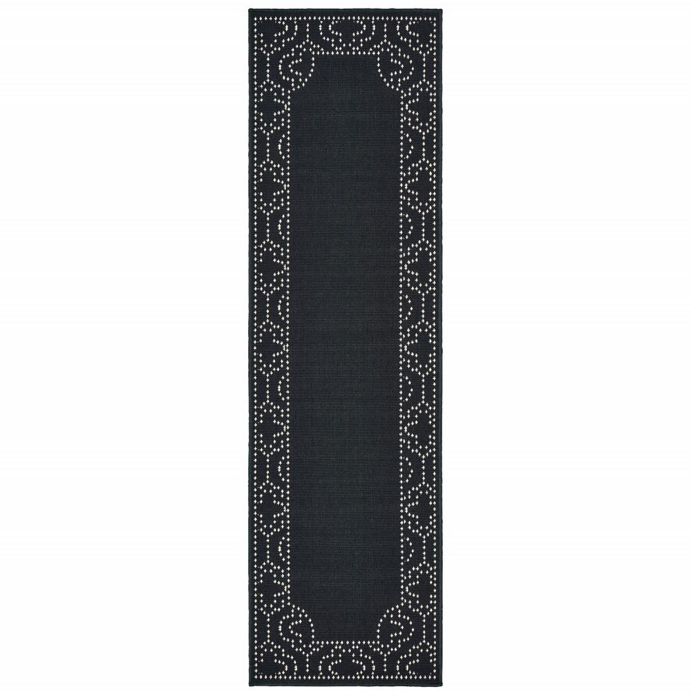 2' X 8' Black and Ivory Stain Resistant Indoor Outdoor Area Rug. Picture 1