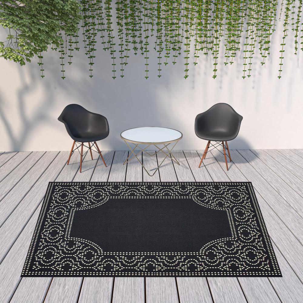 8' x 11' Black and Ivory Stain Resistant Indoor Outdoor Area Rug. Picture 2