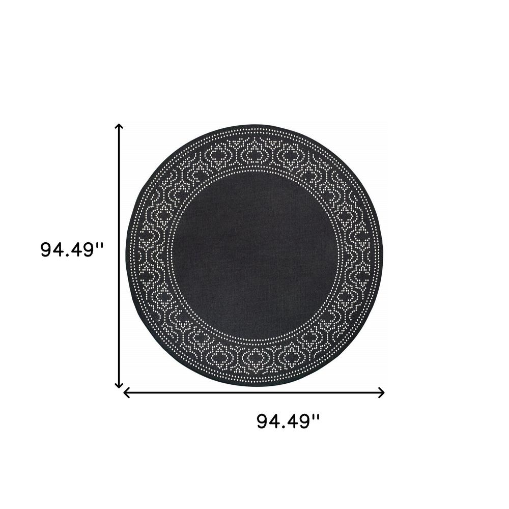 8' x 8' Black and Ivory Round Stain Resistant Indoor Outdoor Area Rug. Picture 5