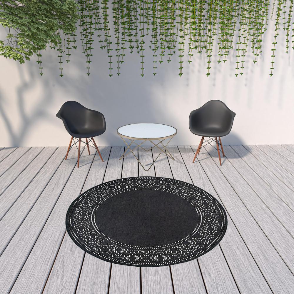8' x 8' Black and Ivory Round Stain Resistant Indoor Outdoor Area Rug. Picture 2