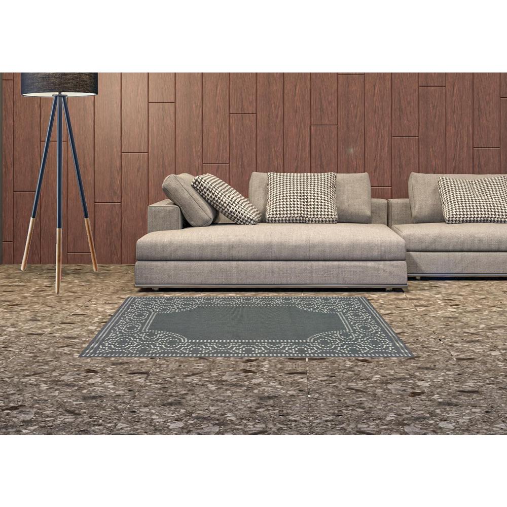 2' X 4' Gray and Ivory Stain Resistant Indoor Outdoor Area Rug. Picture 2