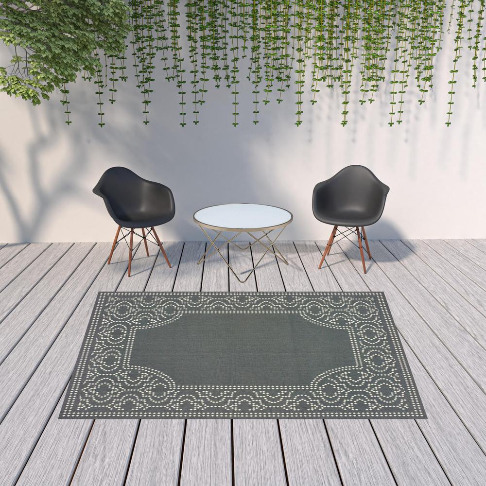 7' x 10' Gray and Ivory Stain Resistant Indoor Outdoor Area Rug. Picture 2