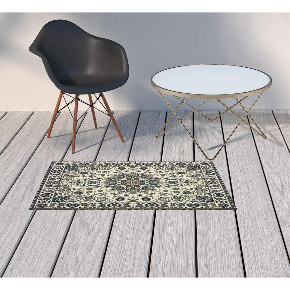 2' X 4' Ivory and Blue Oriental Stain Resistant Indoor Outdoor Area Rug. Picture 2