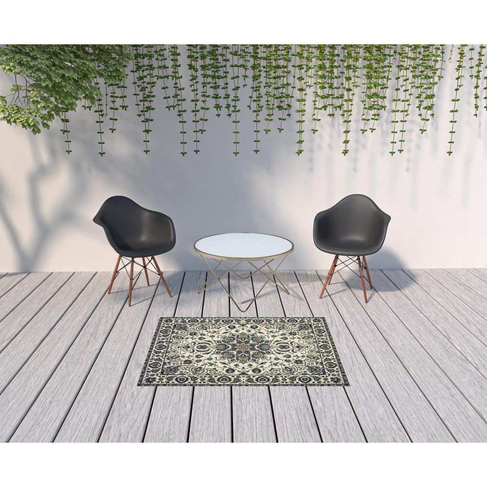 4' x 6' Ivory and Blue Oriental Stain Resistant Indoor Outdoor Area Rug. Picture 2