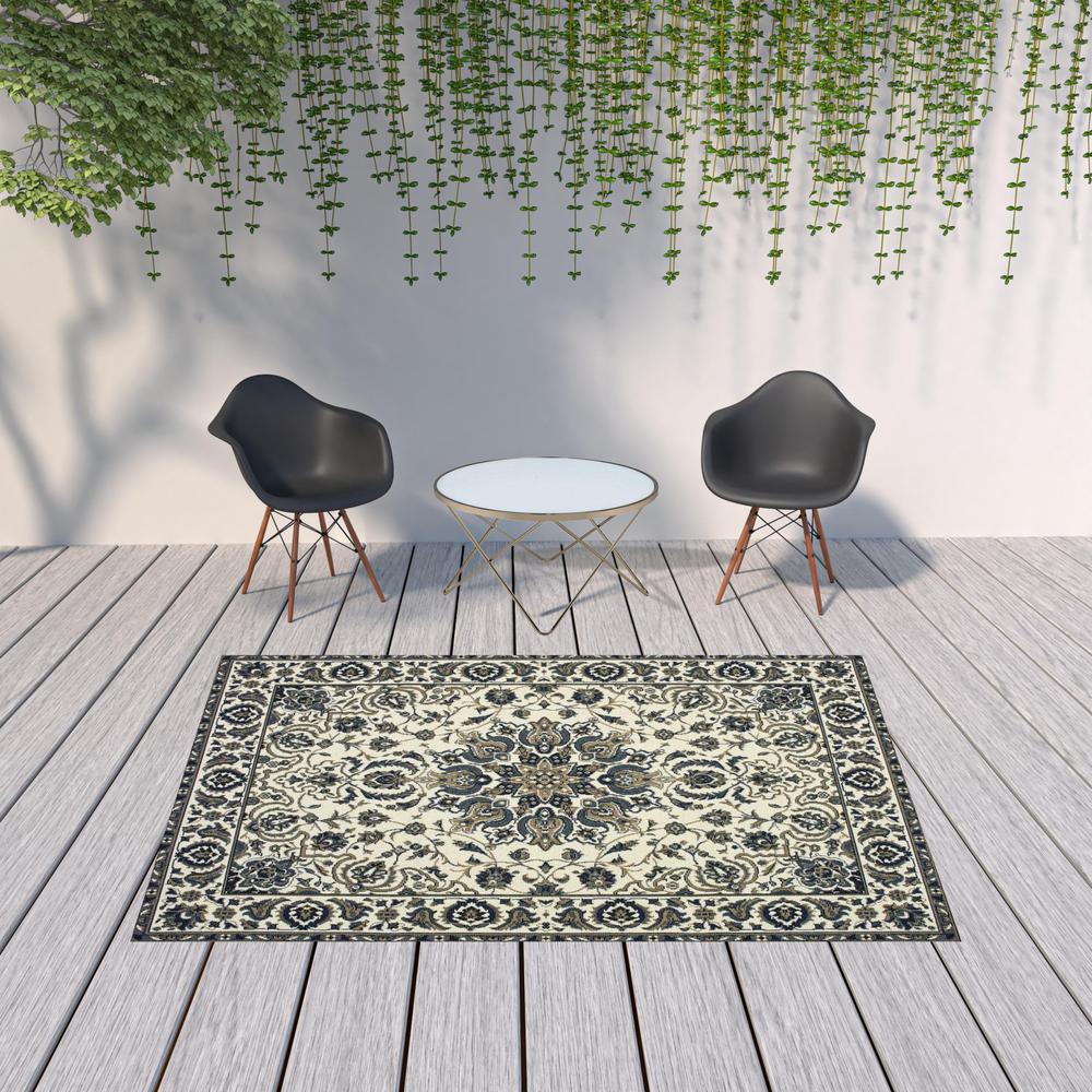 7' x 10' Ivory and Blue Oriental Stain Resistant Indoor Outdoor Area Rug. Picture 2
