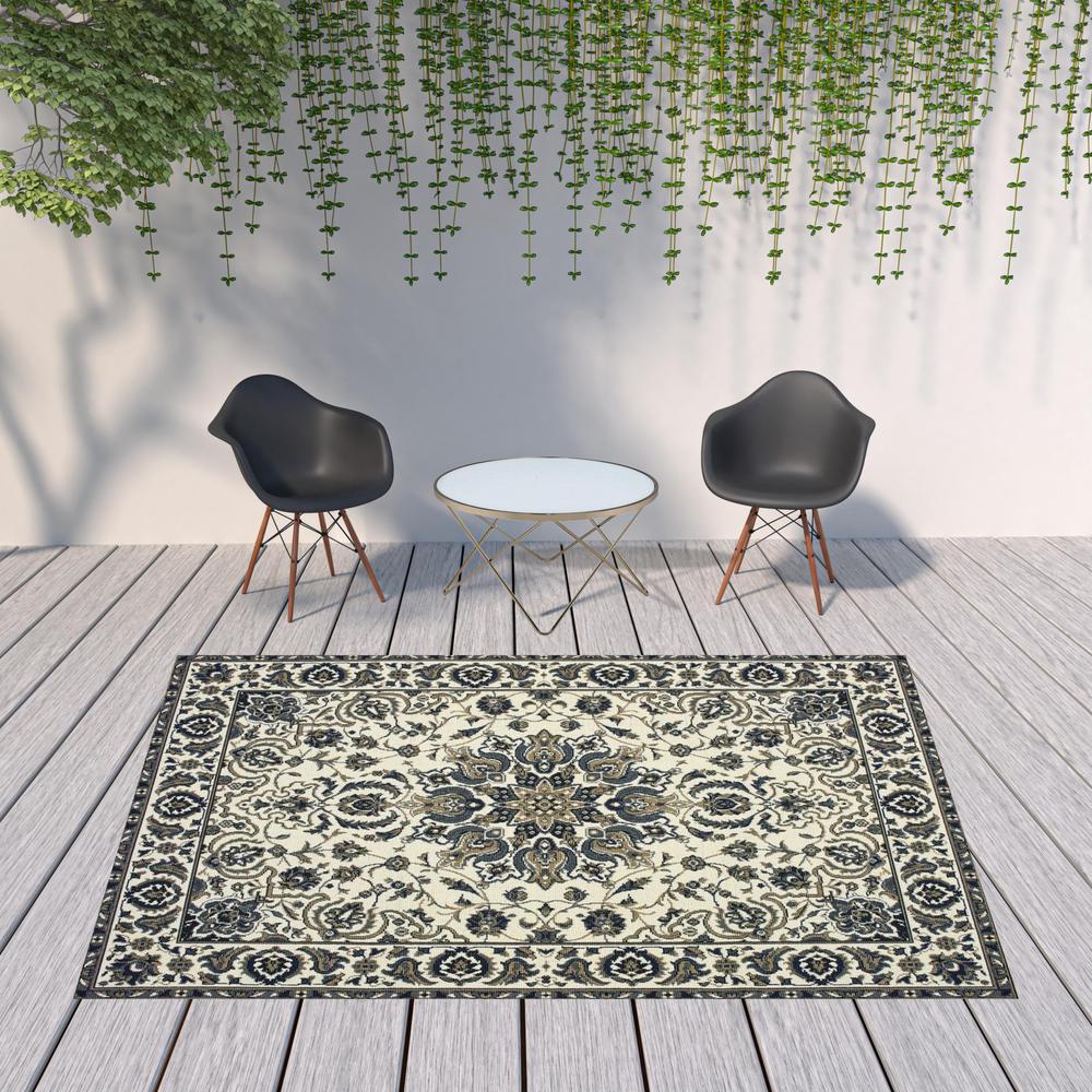 8' x 11' Ivory and Blue Oriental Stain Resistant Indoor Outdoor Area Rug. Picture 2
