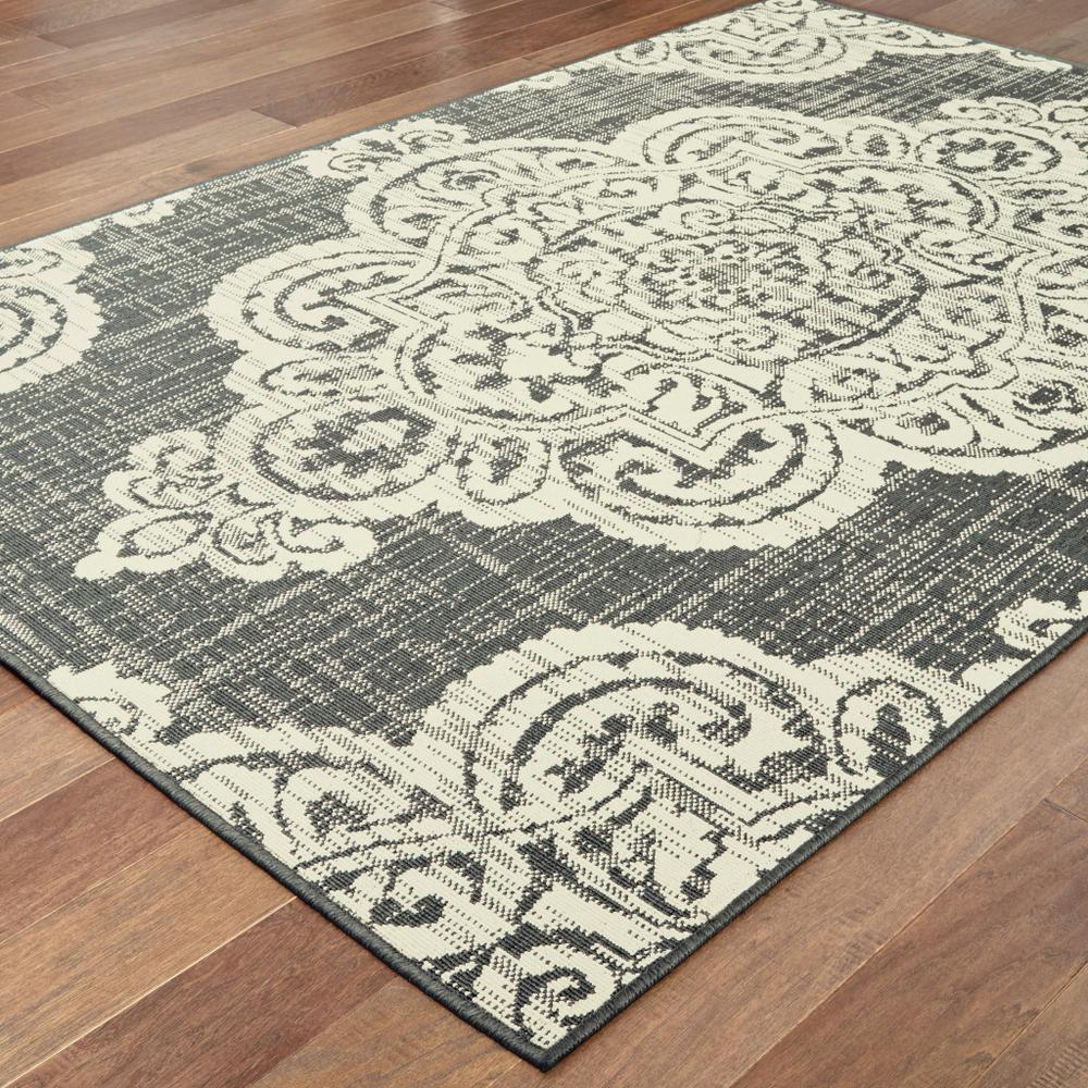 2' X 4' Gray and Ivory Oriental Stain Resistant Indoor Outdoor Area Rug. Picture 4