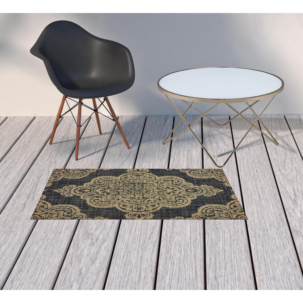 2' X 4' Black and Tan Oriental Stain Resistant Indoor Outdoor Area Rug. Picture 2