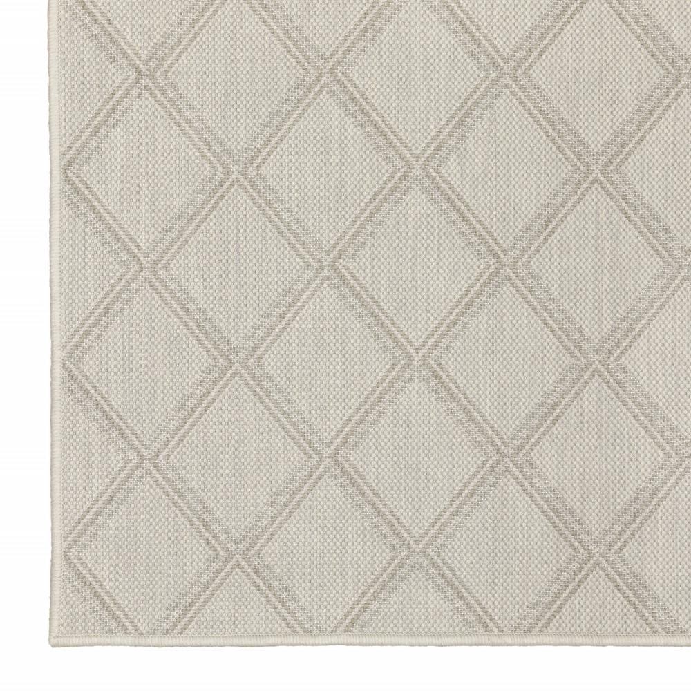 5' x 7' Gray and Ivory Geometric Stain Resistant Indoor Outdoor Area Rug. Picture 3