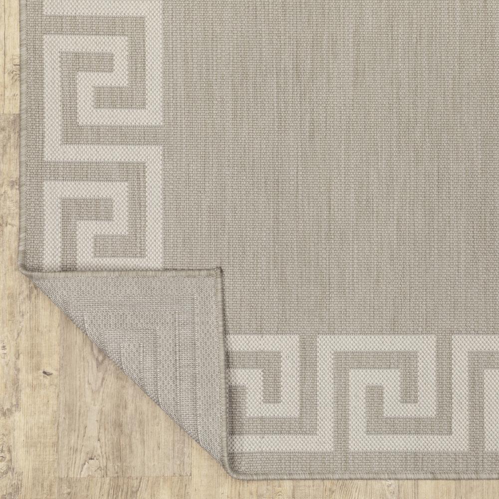 5' x 7' Gray and Ivory Stain Resistant Indoor Outdoor Area Rug. Picture 7