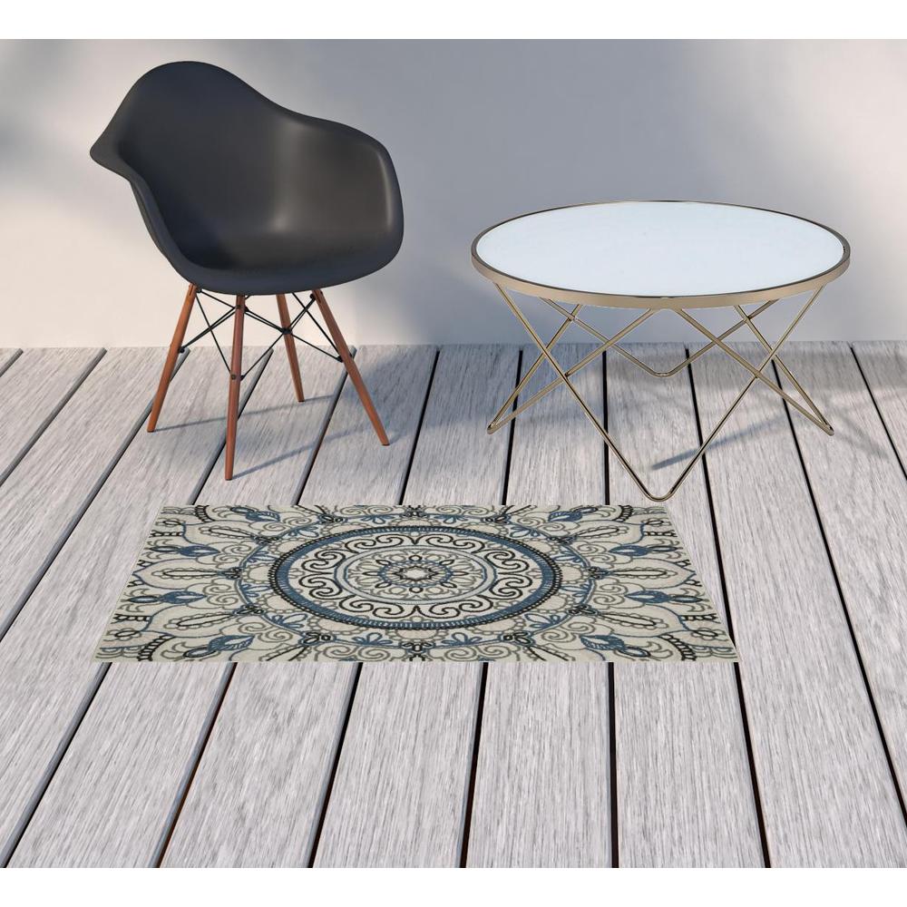 2' X 4' Blue and Beige Geometric Stain Resistant Indoor Outdoor Area Rug. Picture 2