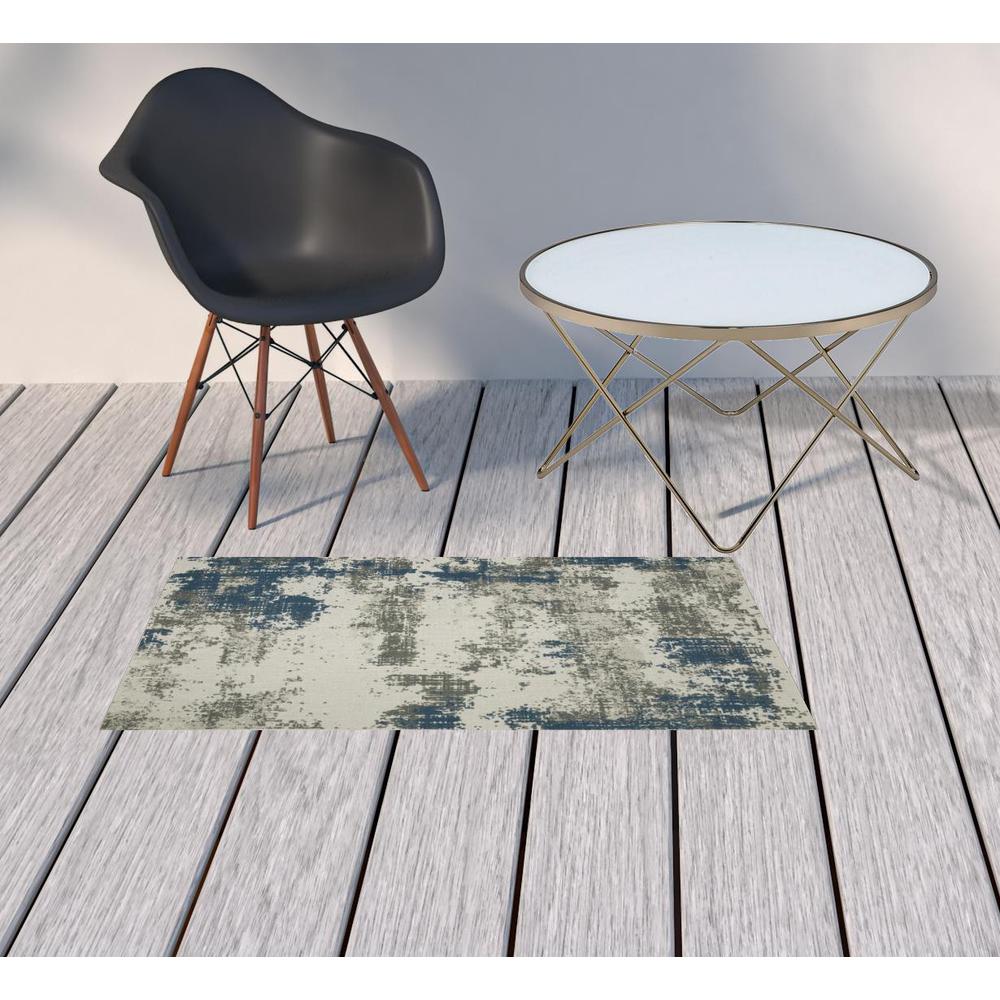 2' X 4' Blue and Beige Abstract Stain Resistant Indoor Outdoor Area Rug. Picture 2