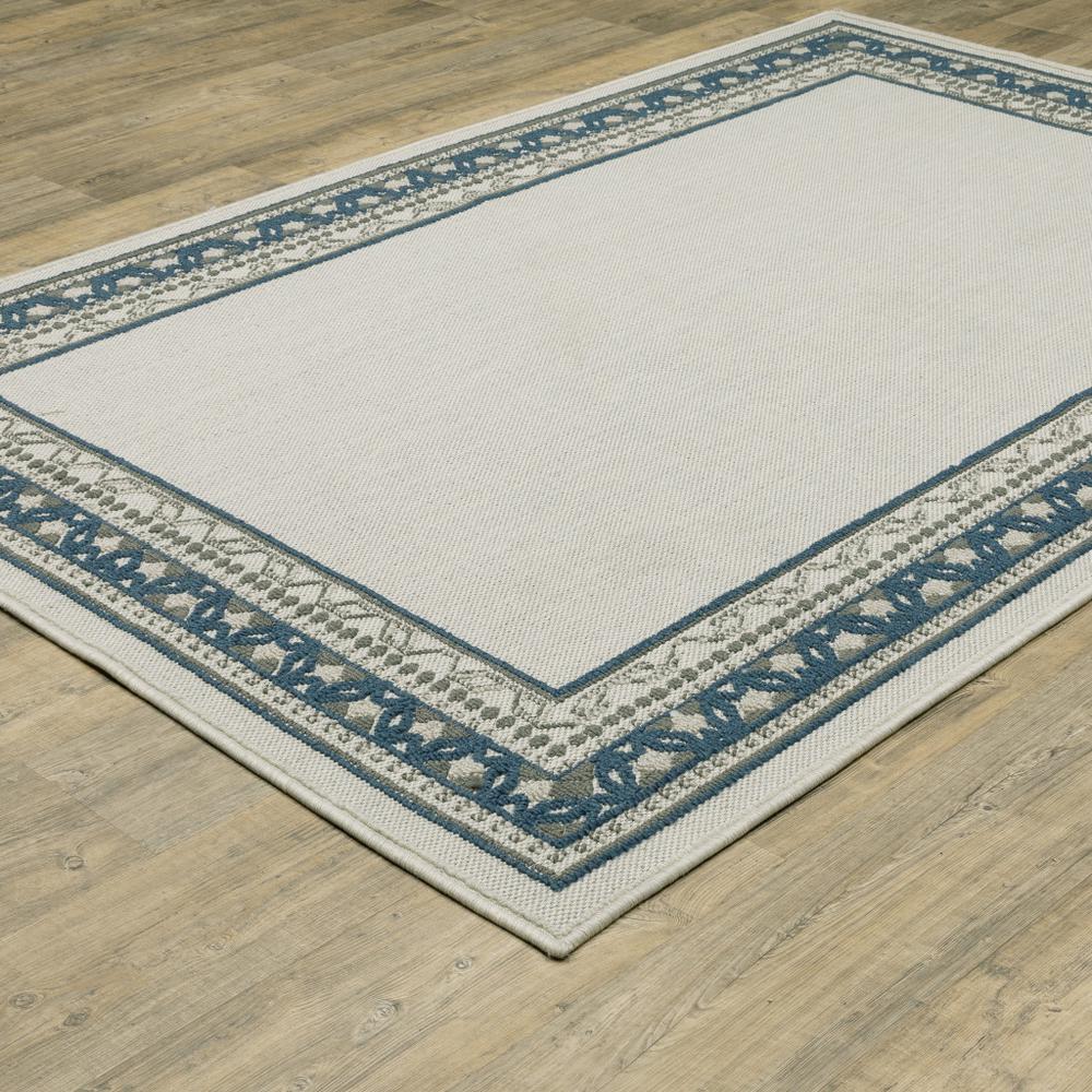 2' X 4' Blue and Beige Stain Resistant Indoor Outdoor Area Rug. Picture 7