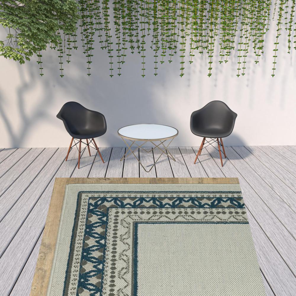 8' x 10' Blue and Beige Stain Resistant Indoor Outdoor Area Rug. Picture 3