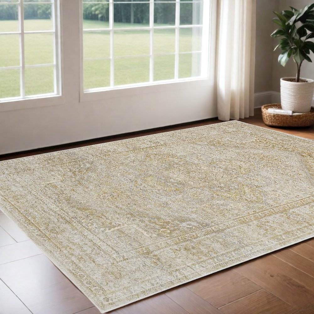 2' X 3' Ivory And Gold Floral Stain Resistant Area Rug. Picture 1