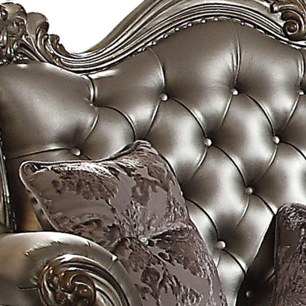 70" Silver And Platinum Faux Leather Love Seat And Toss Pillows. Picture 1