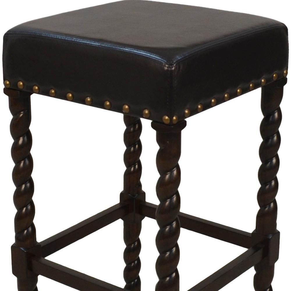 30" Black Faux Leather And Solid Wood Backless Bar Height Chair With Footrest. Picture 4