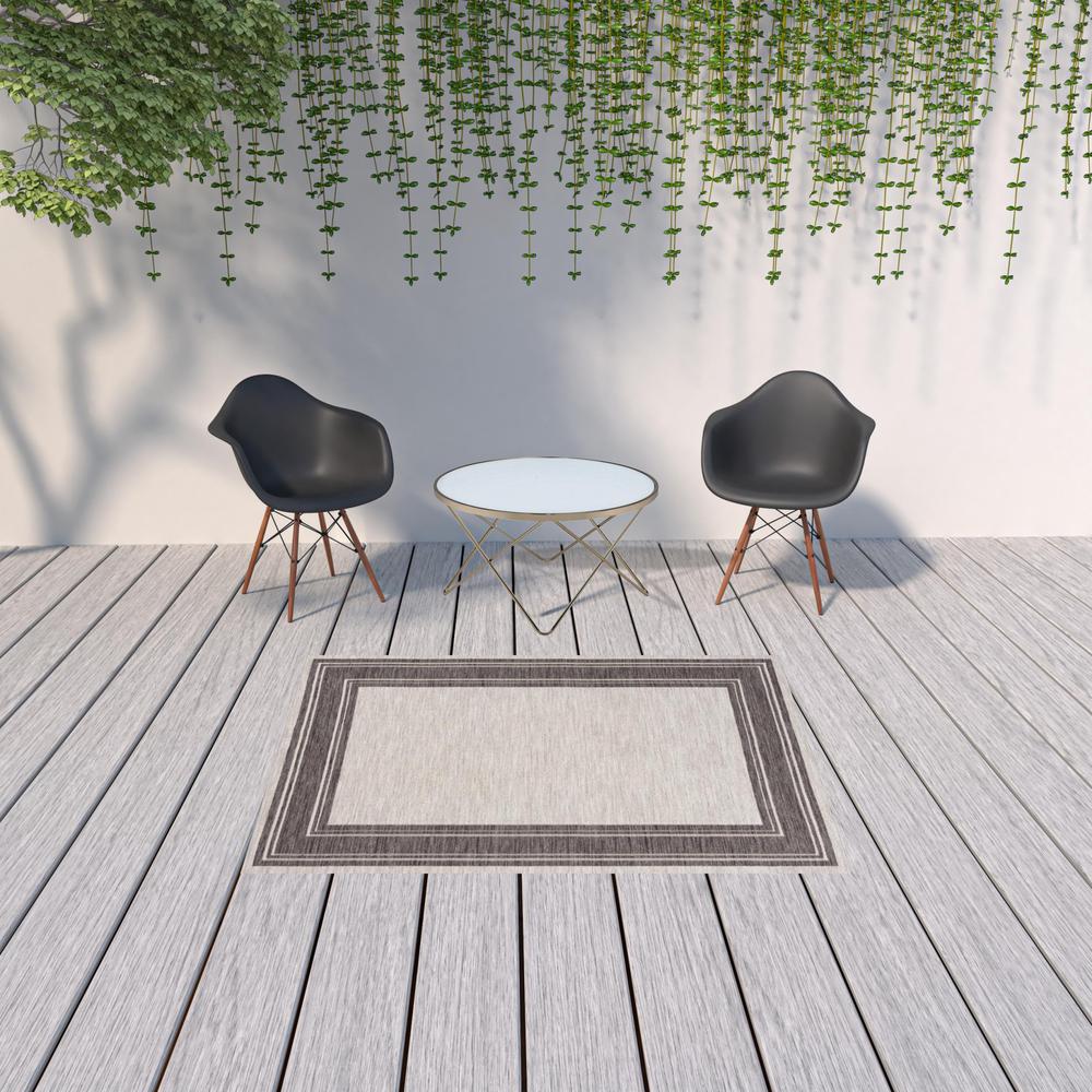 5' X 7' Gray And Ivory Indoor Outdoor Area Rug. Picture 2