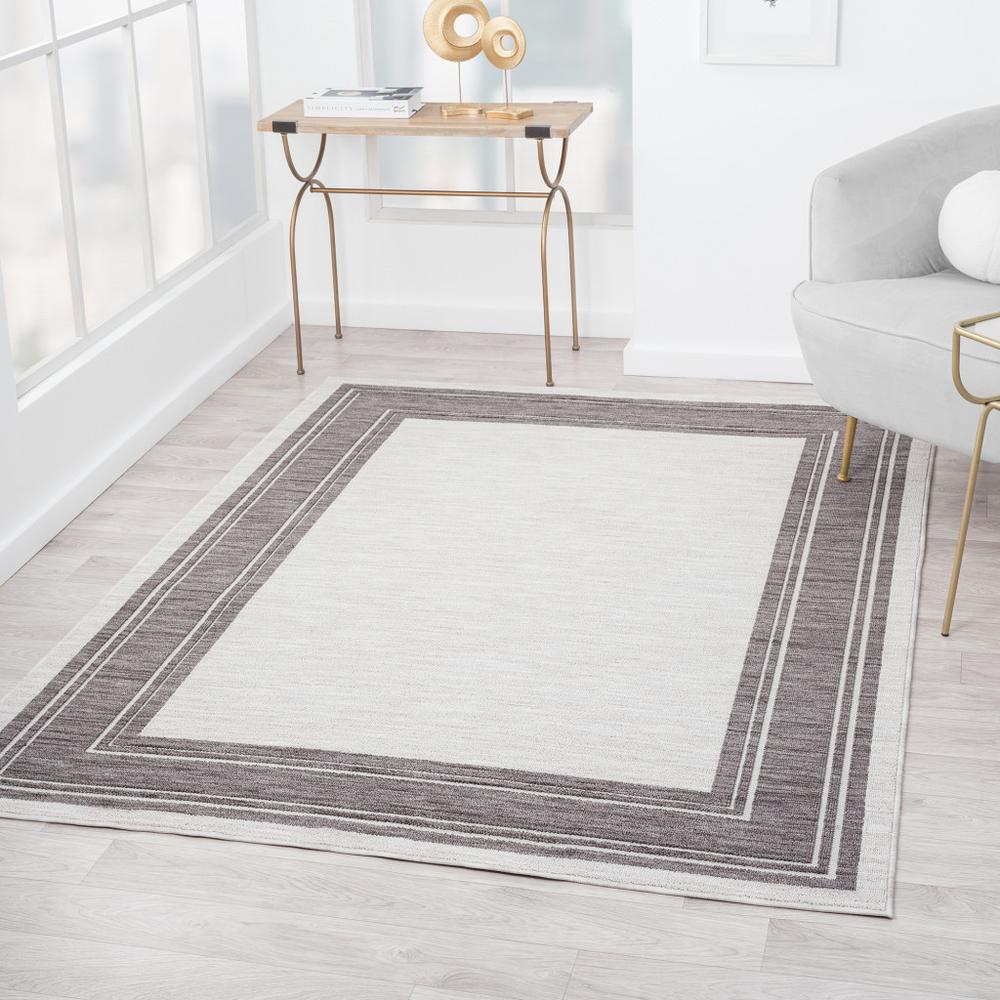 5' X 7' Gray And Ivory Indoor Outdoor Area Rug. Picture 9