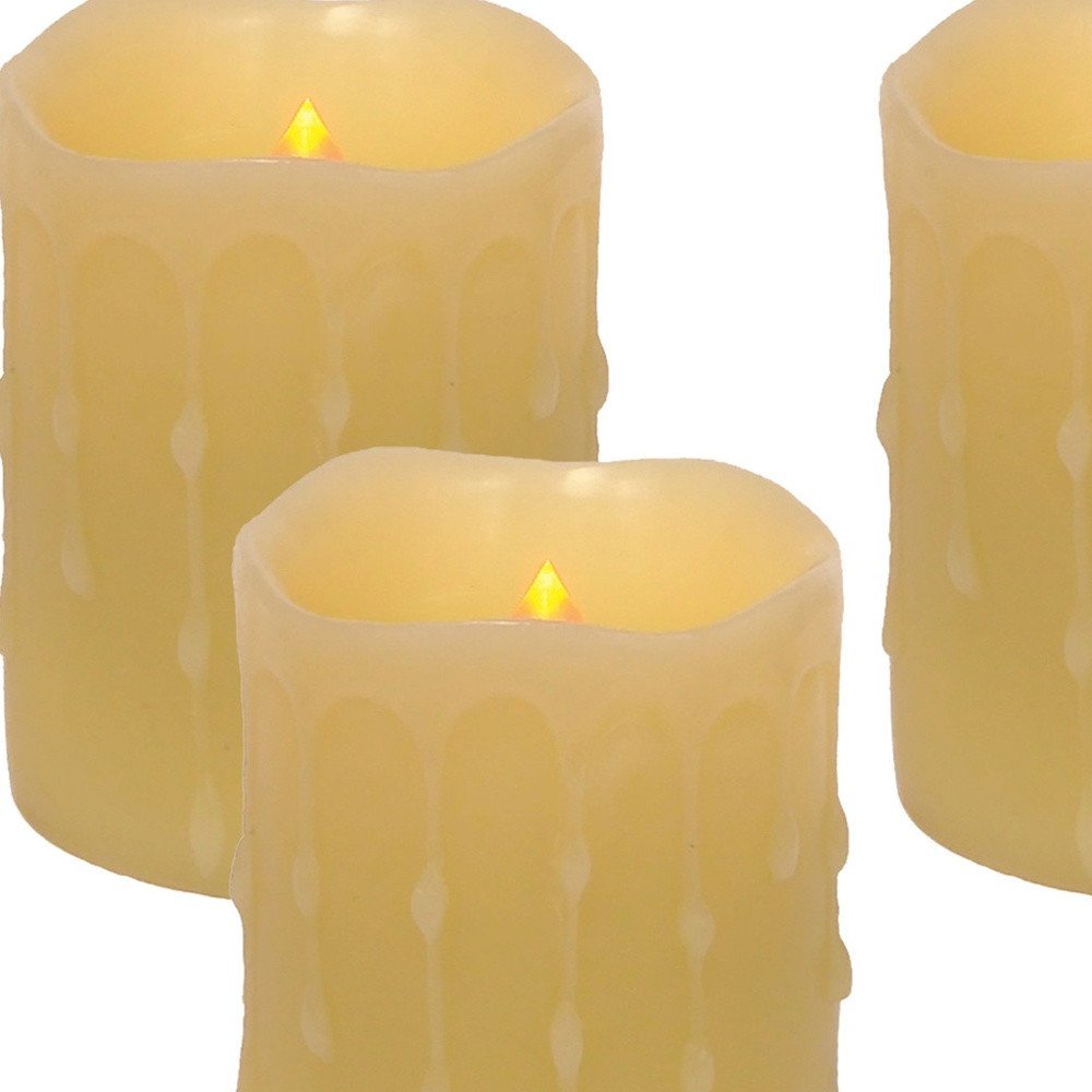 Set Of Four Yellow Flameless Pillar Candle. Picture 7