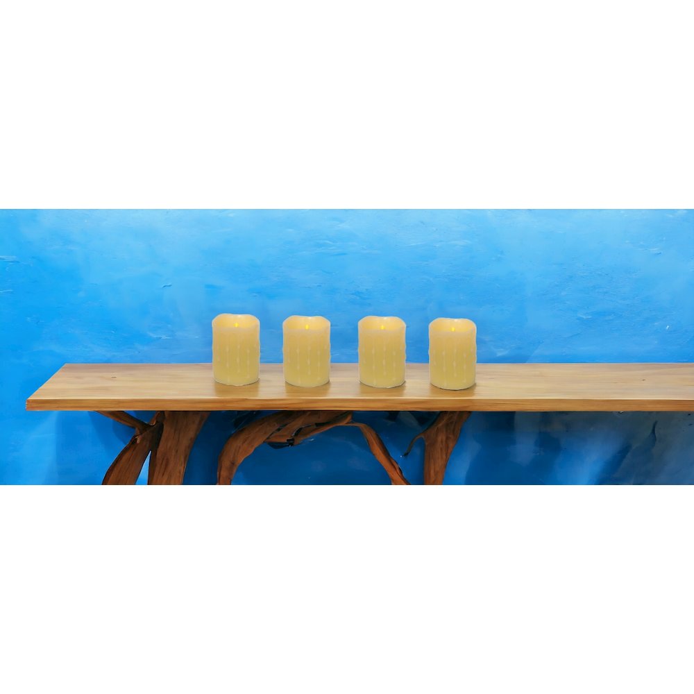 Set Of Four Yellow Flameless Pillar Candle. Picture 1