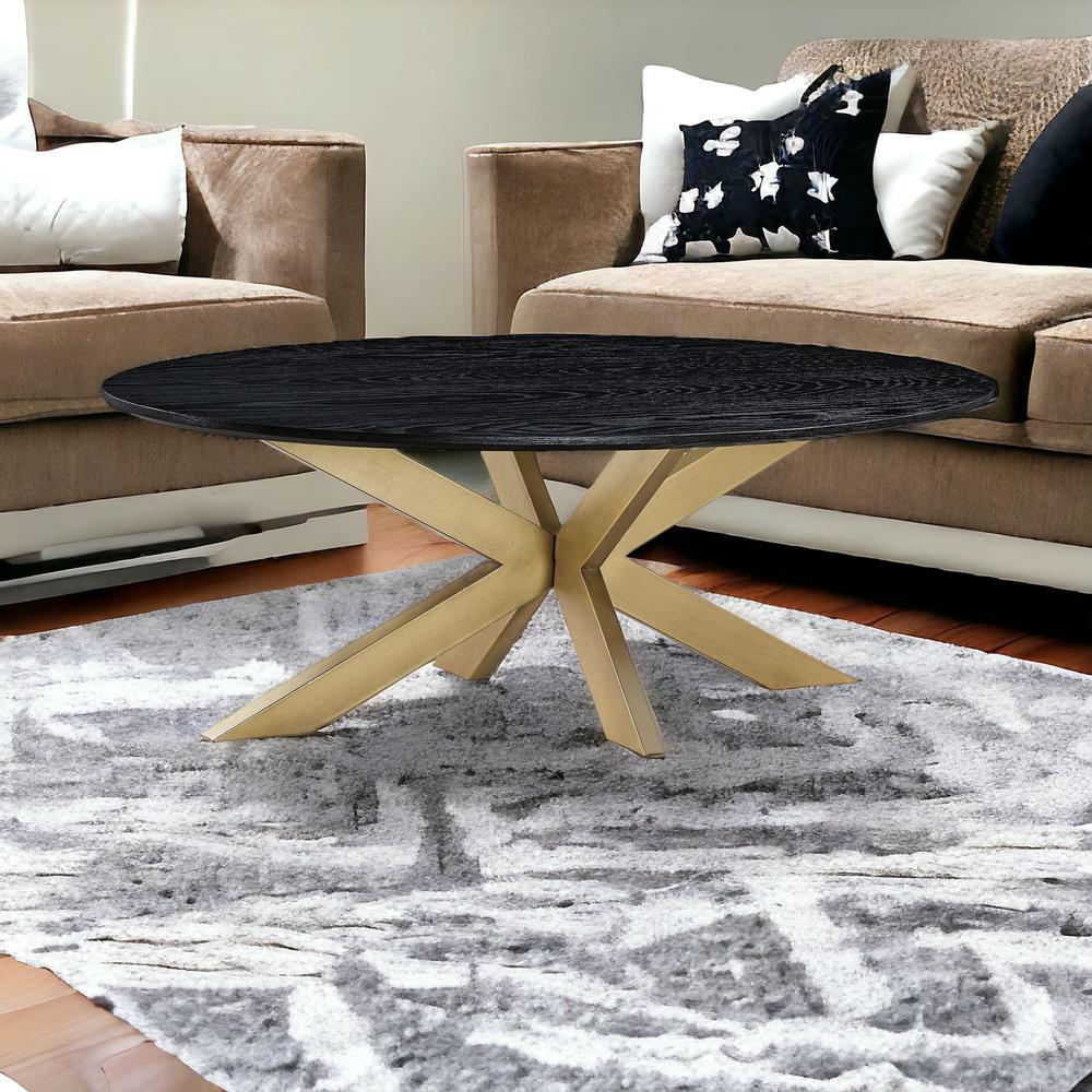 24" Black And Brass Solid Wood And Metal Oval Coffee Table. Picture 2