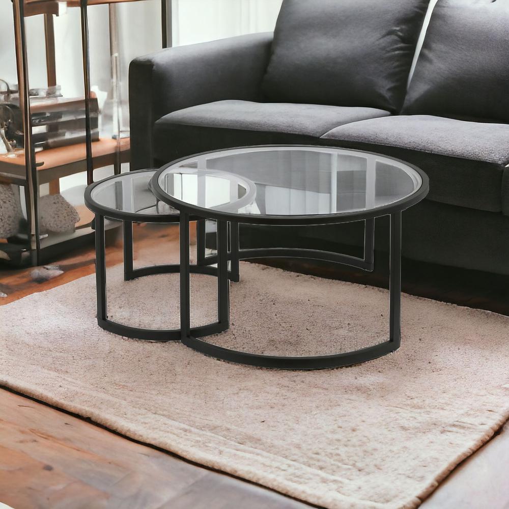Set of Two 36" Black Glass And Steel Round Nested Coffee Tables. Picture 2