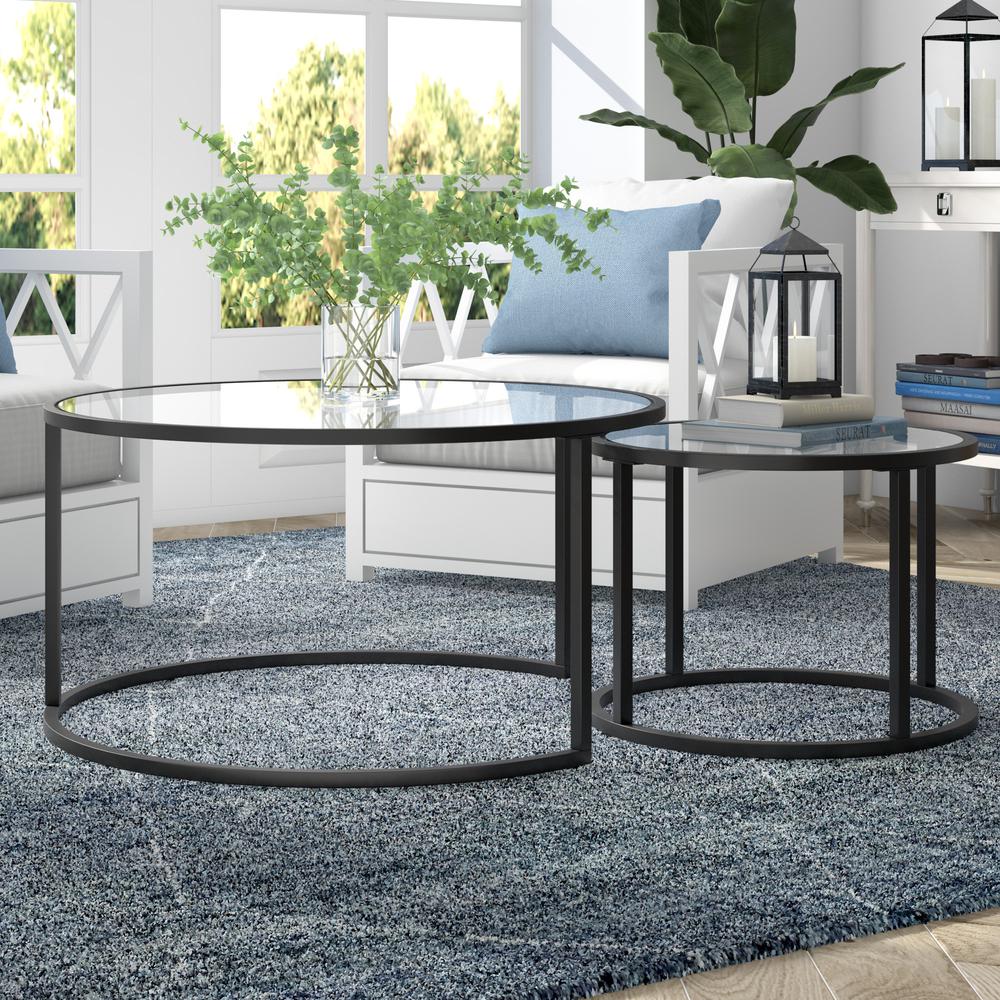 Set of Two 35" Black Glass And Steel Round Nested Coffee Tables. Picture 6