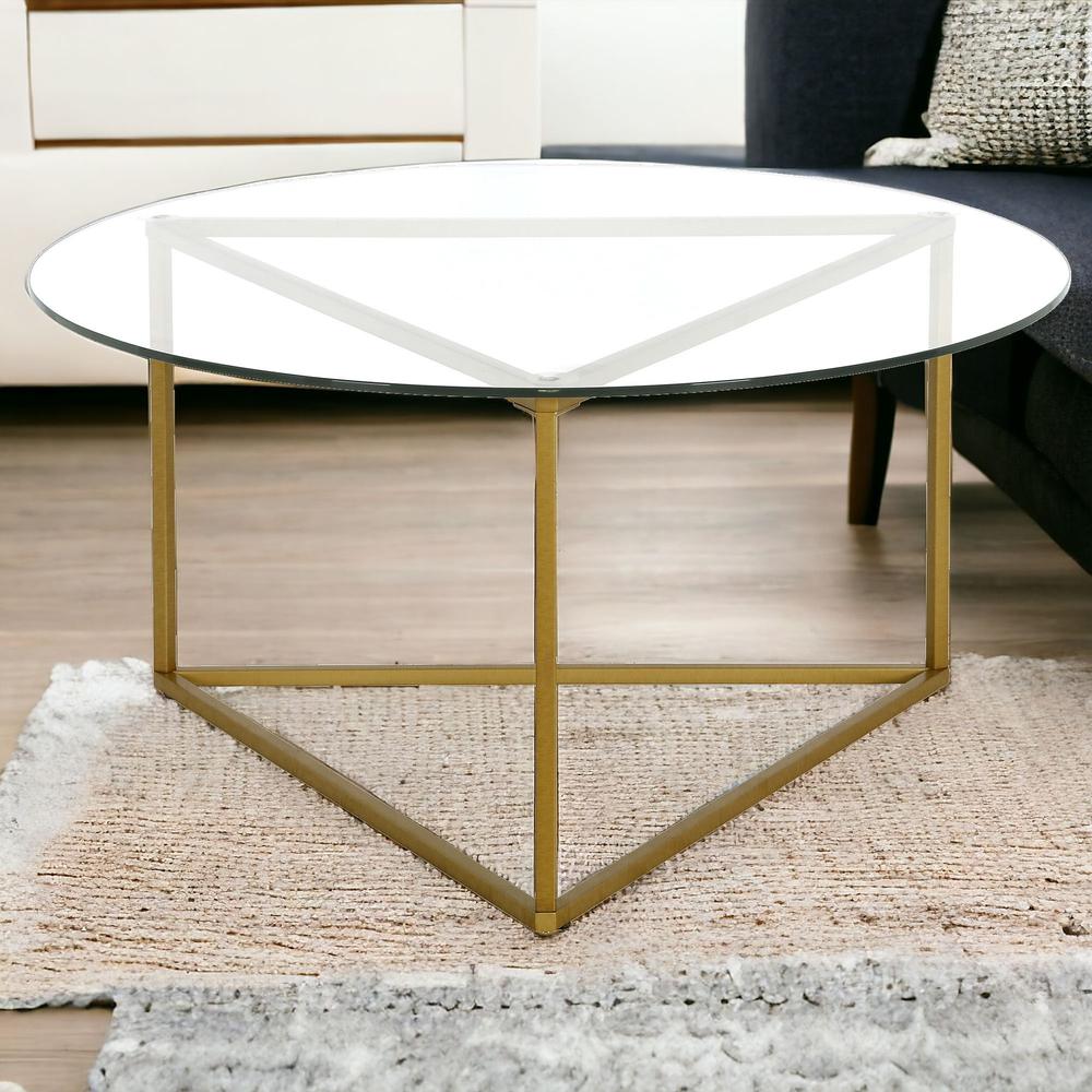 35" Gold Glass And Steel Round Coffee Table. Picture 2