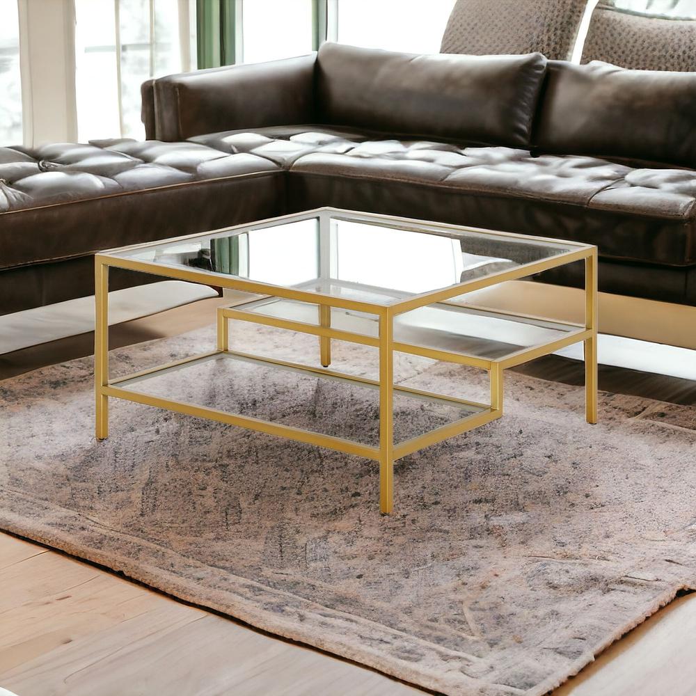 32" Gold Glass And Steel Square Coffee Table With Two Shelves. Picture 2