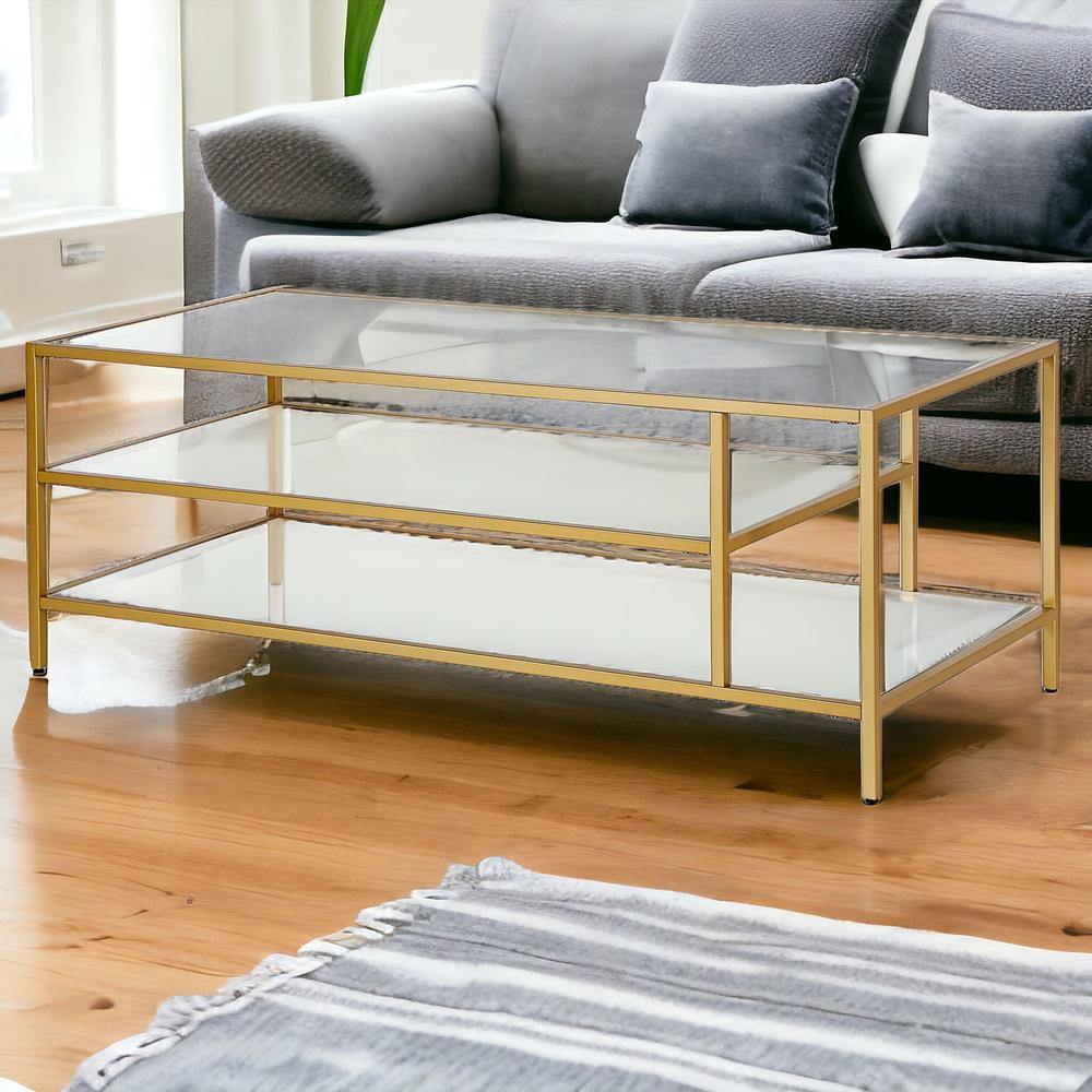 46" Gold Glass And Steel Coffee Table With Two Shelves. Picture 2