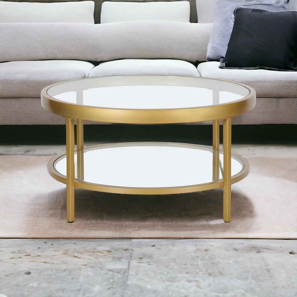 32" Gold Glass And Steel Round Coffee Table With Shelf. Picture 2