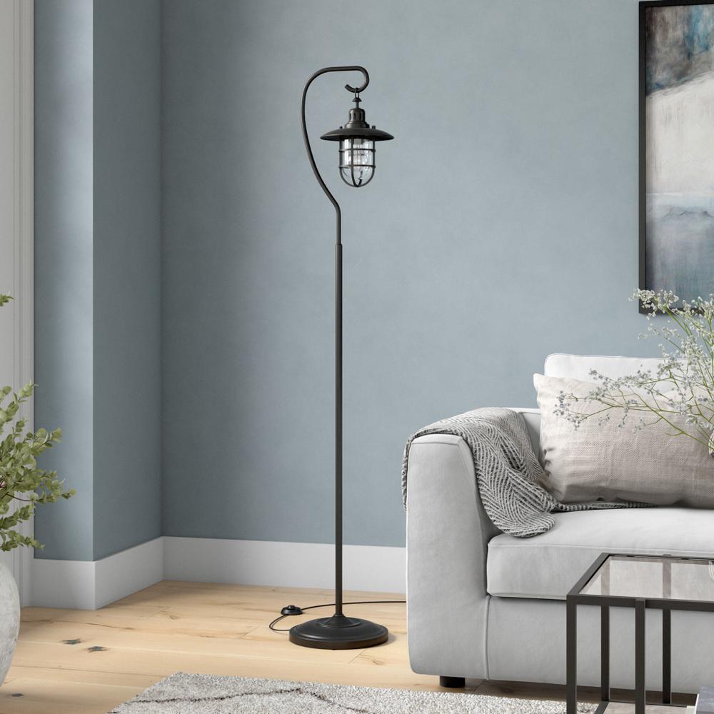 63" Black Arched Floor Lamp With Clear Transparent Glass Globe Shade. Picture 6