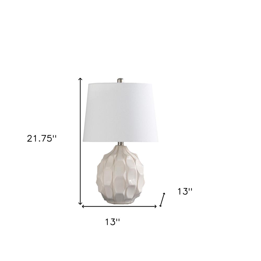 22" Cream Ceramic Faceted Table Lamp With Off White Drum Shade. Picture 6