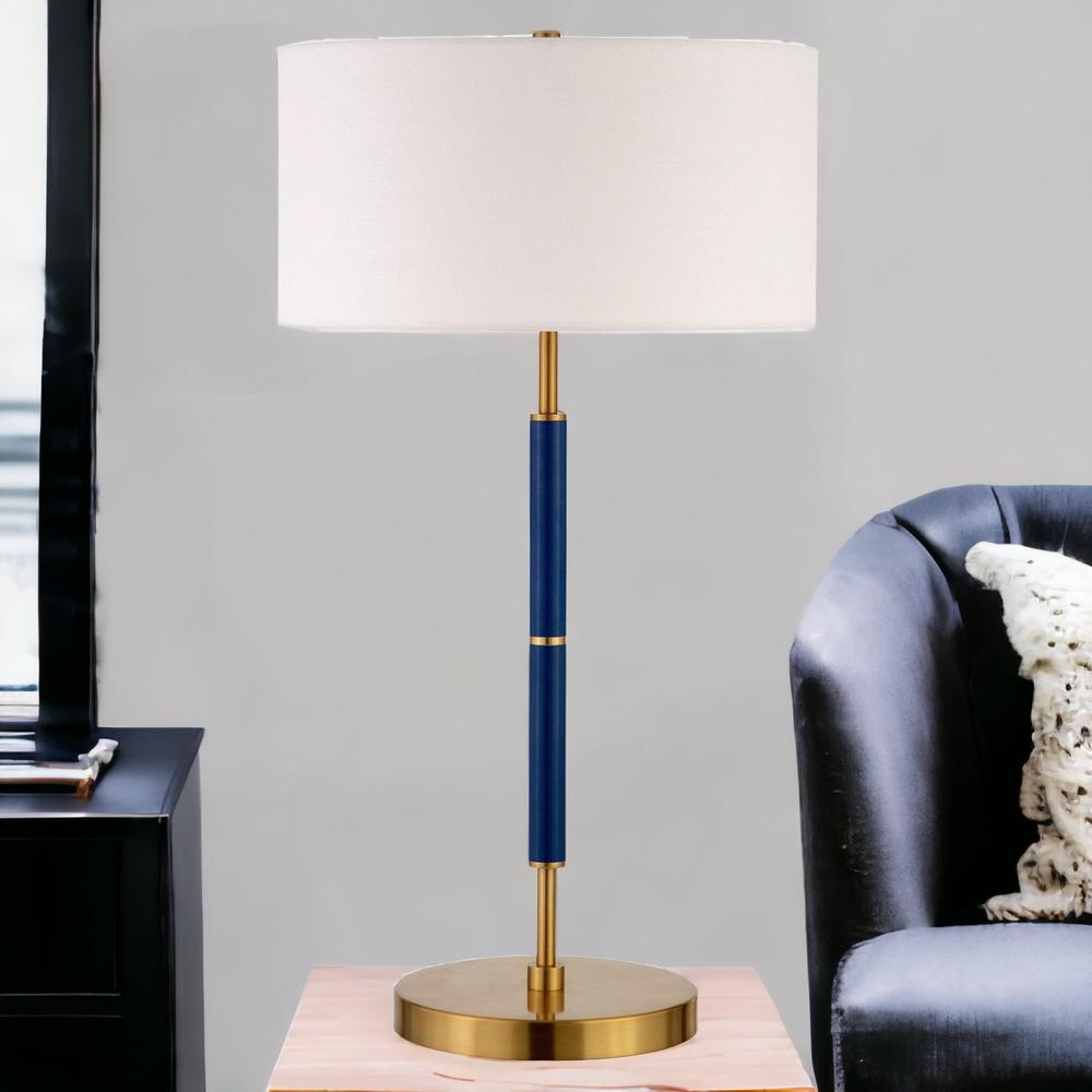 25" Blue and Gold Metal Two Light Table Lamp With White Drum Shade. Picture 3