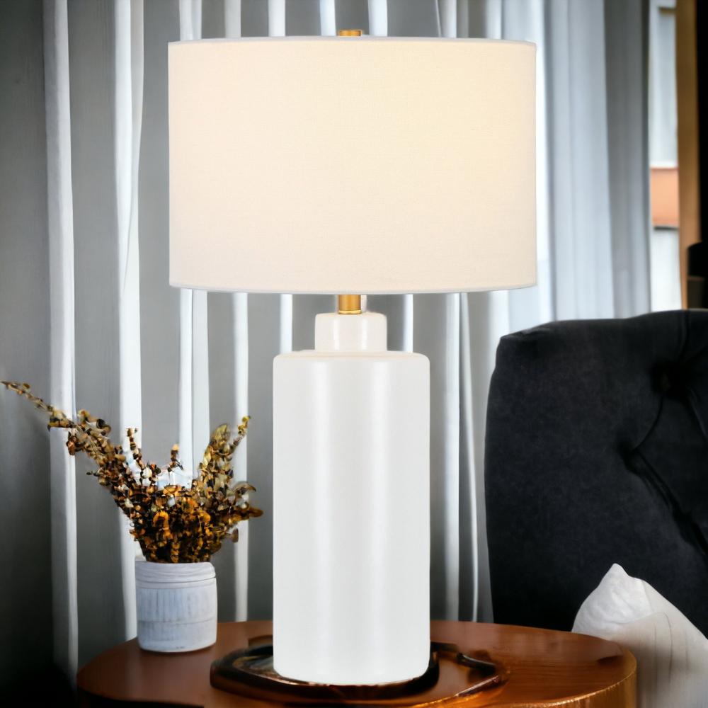 25" White Ceramic Table Lamp With White Drum Shade. Picture 5