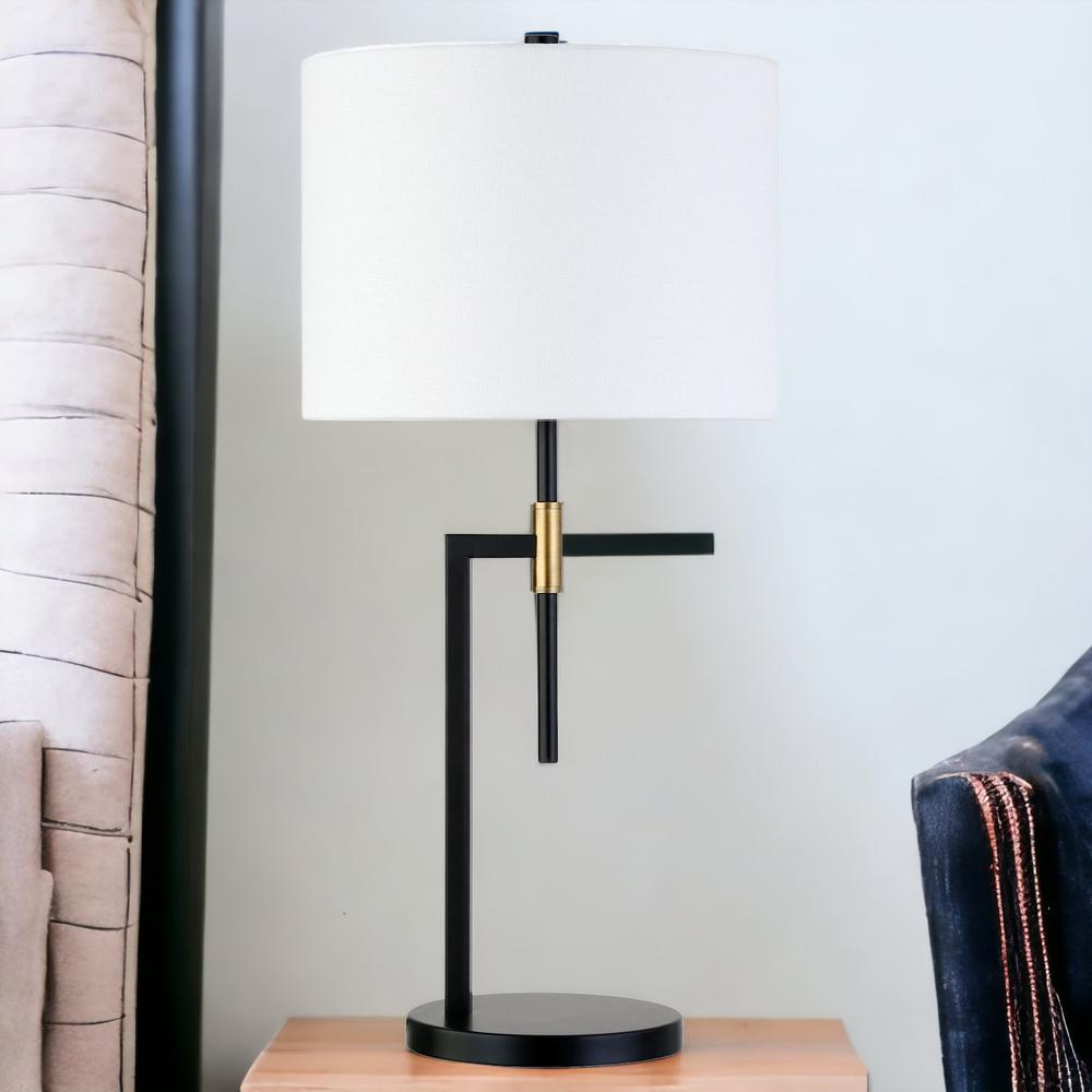 25" Black and Gold Metal Table Lamp With White Drum Shade. Picture 4