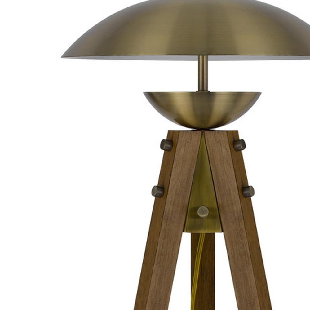 55" Brass Tripod Floor Lamp With Antiqued Brass Dome Shade. Picture 4