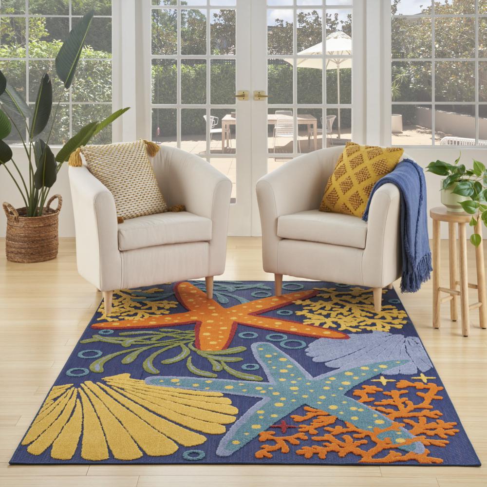 5' x 7' Blue and Orange Starfish Power Loom Area Rug. Picture 5