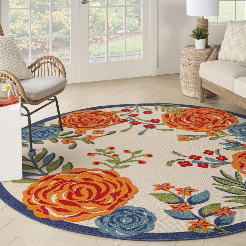 8' Blue and Orange Round Floral Power Loom Area Rug. Picture 7