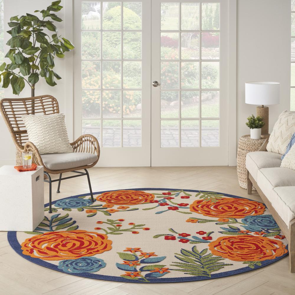 8' Blue and Orange Round Floral Power Loom Area Rug. Picture 8