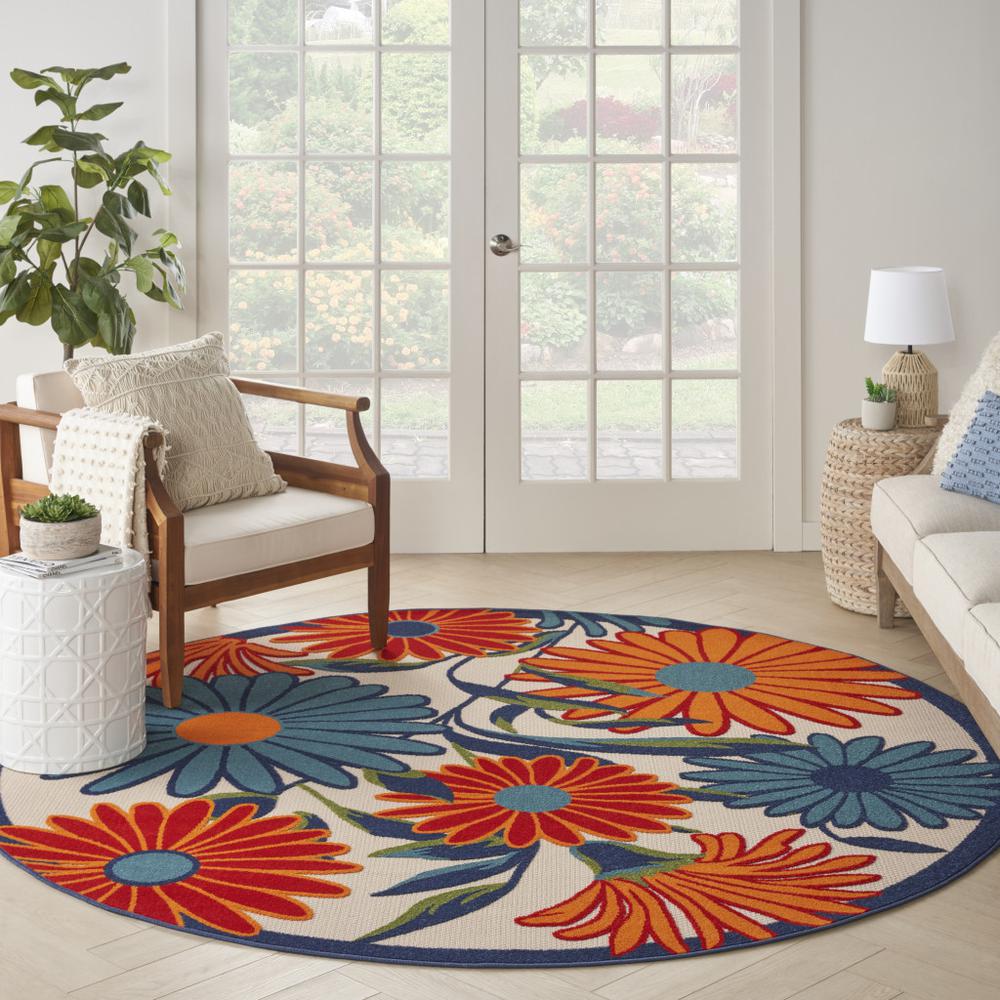 8' Blue and Orange Round Floral Power Loom Area Rug. Picture 9