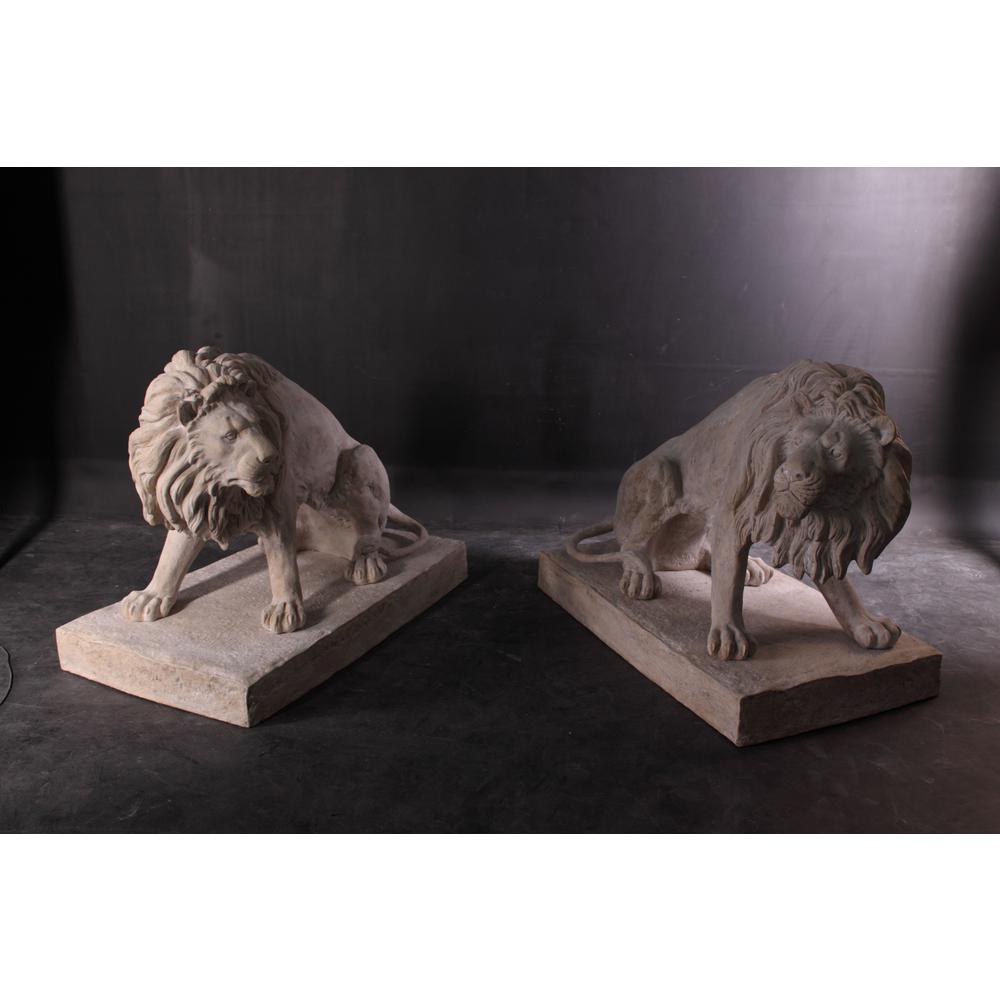 Symmetrical Pair of 39 Inch Entry Lions in Rough Stone. Picture 1